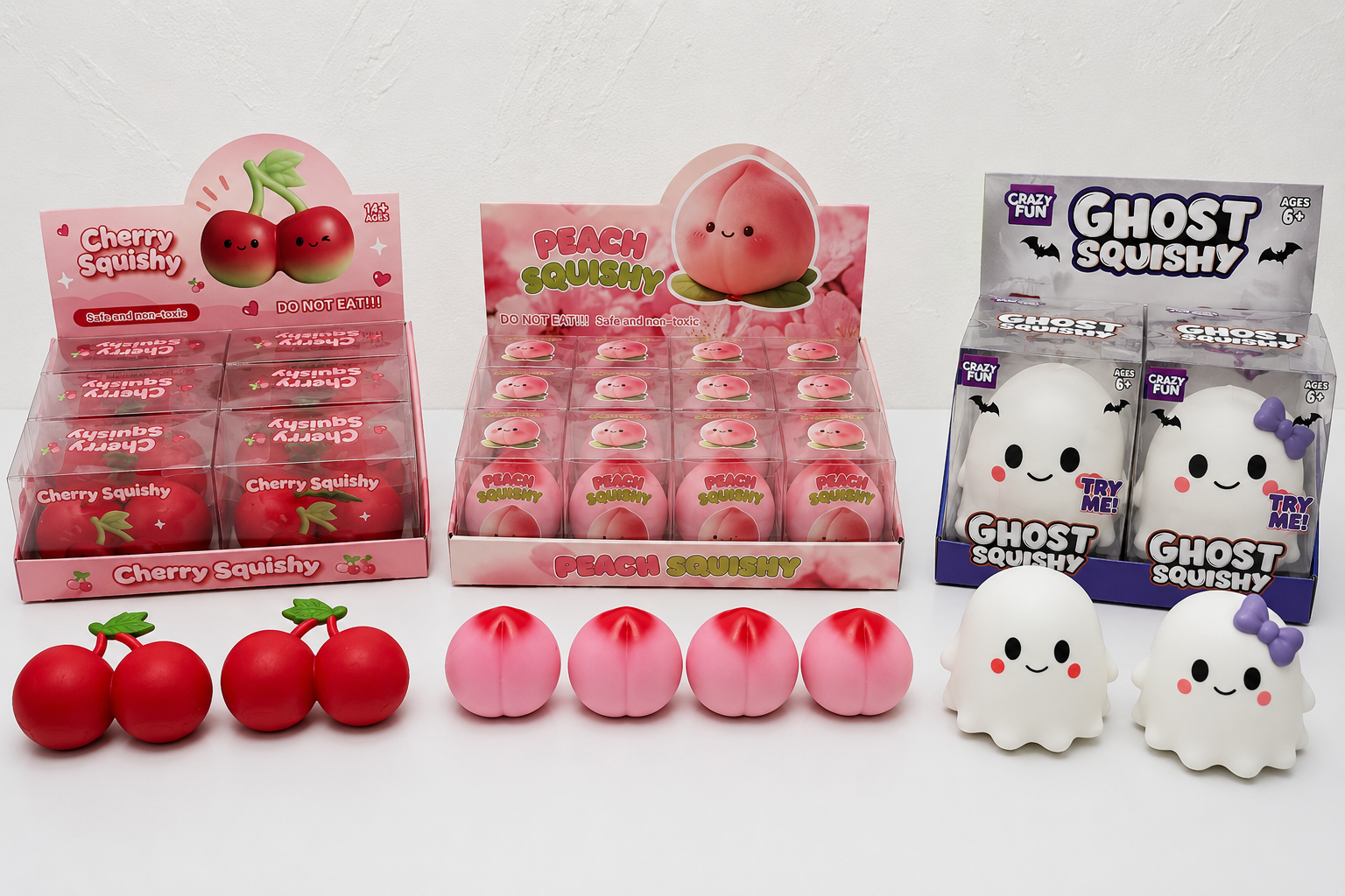 Novelty toy MOQ assortment with cherry, peach and ghost squishy toys in retail display packaging