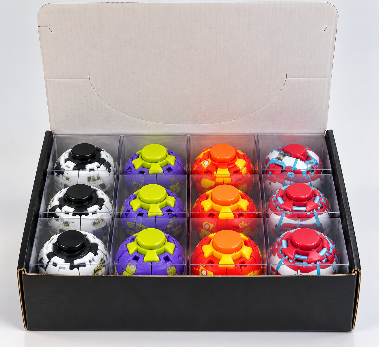 Small toys in bulk arranged in a countertop display box with individual compartments