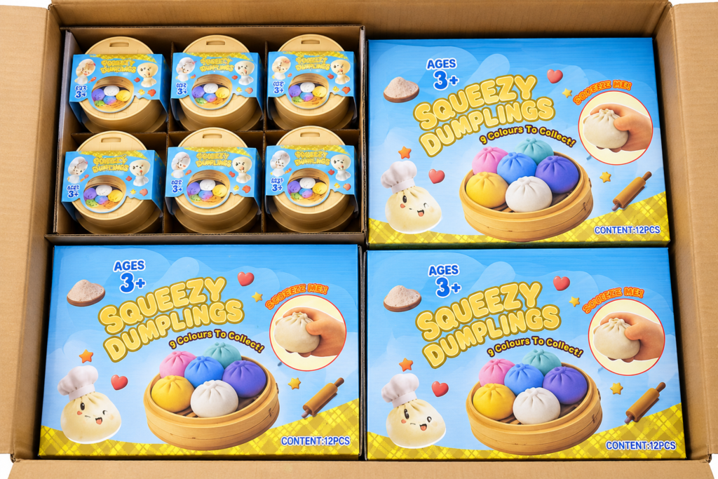Custom toy packaging showing individual retail units, display boxes and a master carton