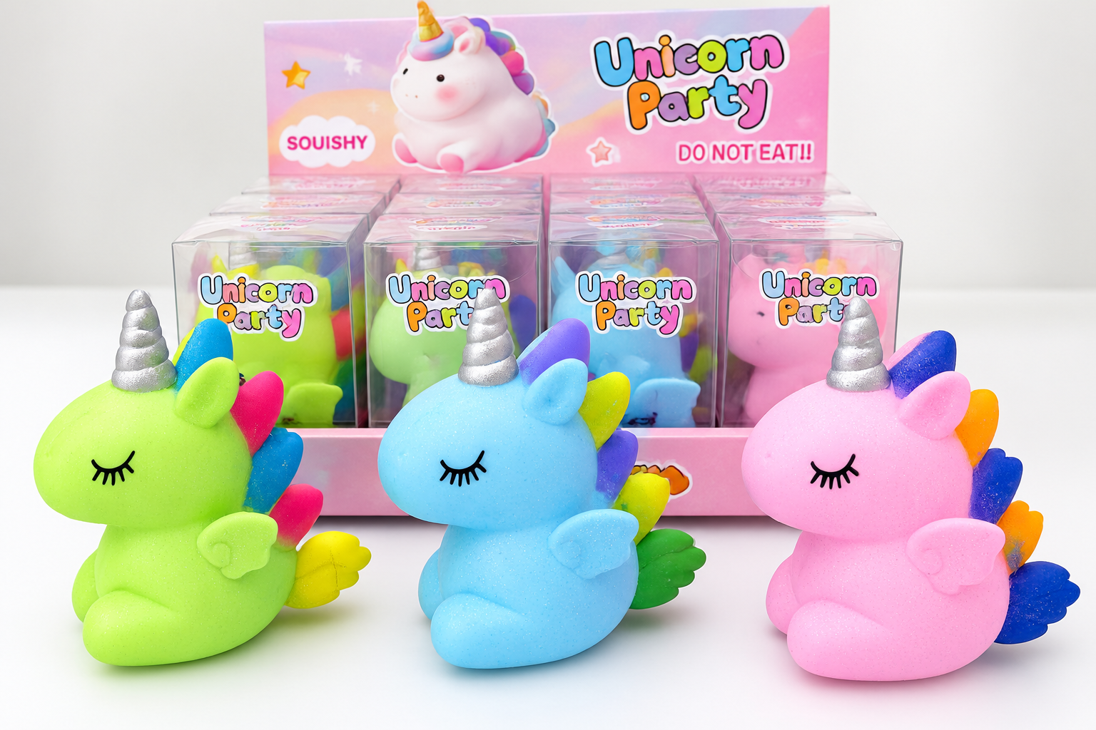 Green, blue and pink unicorn squishy toys showing color variations within the same product