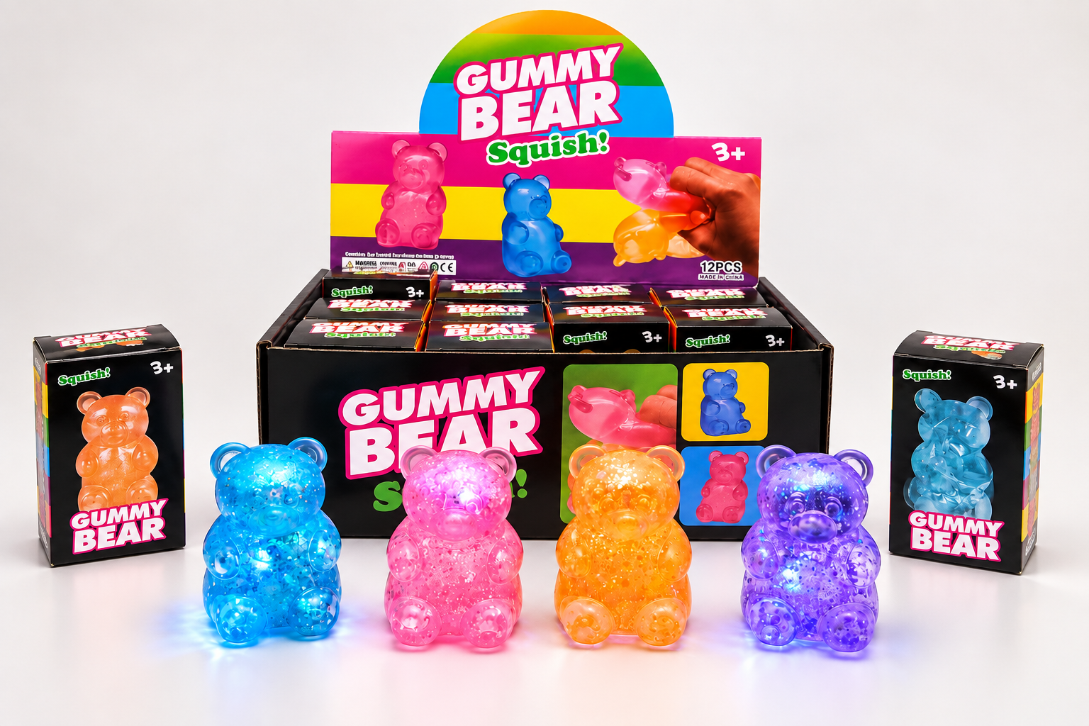 Gummy bear squishy toys in multiple colorways with individual boxes and retail display packaging