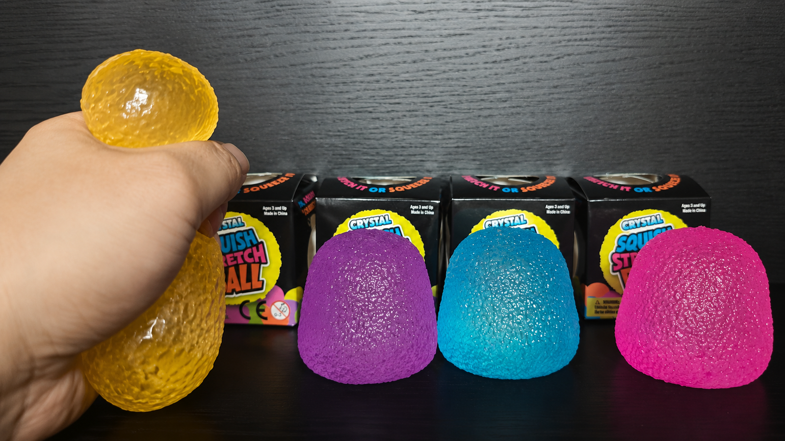 Squishy toy suppliers sample comparison with hand squeeze test and multiple textured squishy products