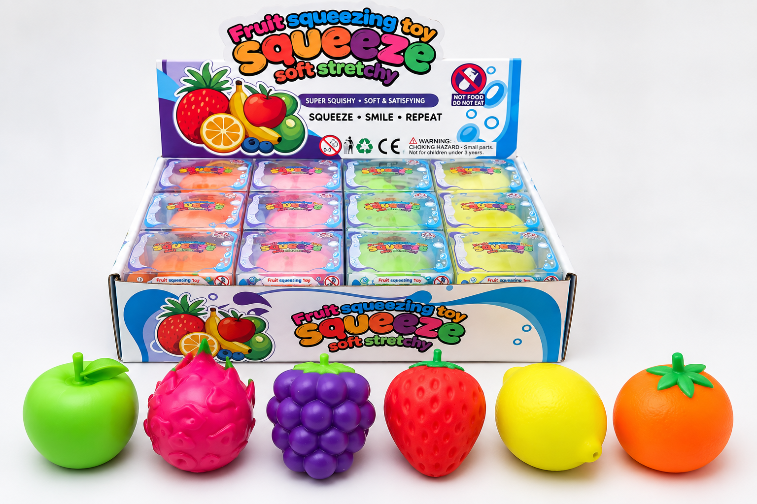 Fruit-shaped squeeze toys with 12-piece retail display packaging
