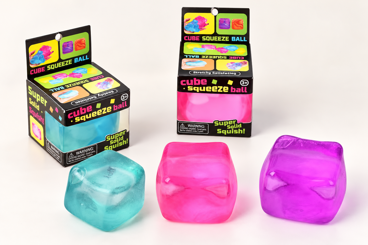 Three cube squishy toy texture samples in teal, pink and purple with retail packaging